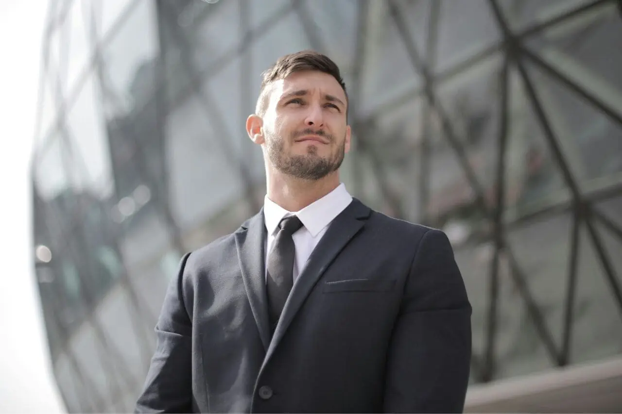 Professional business man in formal suit representing professional resume services for Elite Resume Writer
